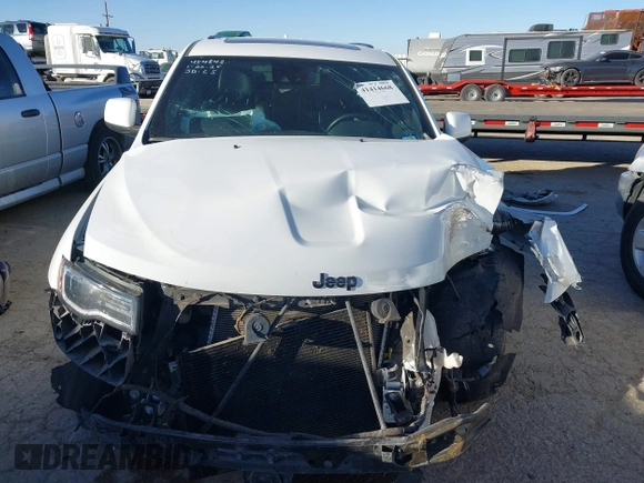 2021 Jeep Grand Cherokee Laredo X with VIN 1C4RJEAG6MC658195, listed as a IAAI auction lot 41414668 with 52,488 mi miles and . Bid and sale history available at DreamBid. Image 13.