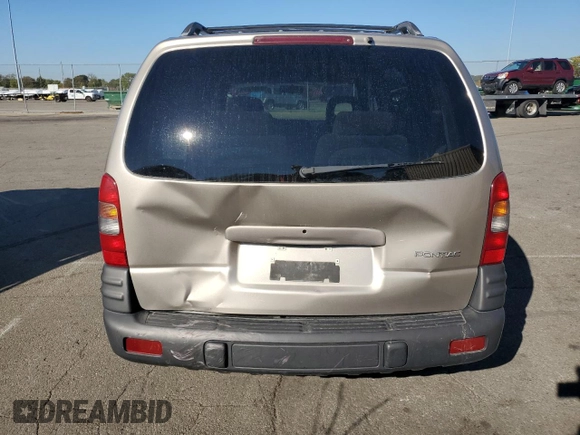 2000 Pontiac Montana z VIN 1GMDU23E1YD161191, wystawiony jako Copart lot #75875084 z przebiegiem 127 983 mil mil oraz Szkoda całkowita • Salvage title. Historia ofert i sprzedaży dostępna na DreamBid. Obrazek 6.
