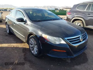 2012 Volkswagen CC Sport PZEV with VIN WVWMP7AN6CE545188, listed as a IAAI auction lot 42022015 with 122,184 mi miles. Bid and sale history available at carsss.com. Image 1.