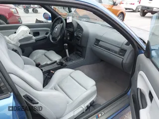 1999 BMW 3 Series M3 with VIN WBSBG9336XEY80979, listed as a IAAI auction lot 41179676 with 262,233 mi miles. Bid and sale history available at carsss.com. Image 5.