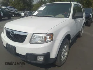 2008 Mazda Tribute Touring with VIN 4F2CZ96138KM32735, listed as a IAAI auction lot 31145122 with 206,608 mi miles and . Bid and sale history available at DreamBid. Image 6.