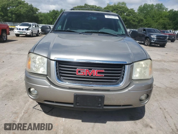 2002 GMC Envoy SLT z VIN 1GKDS13S722253150, wystawiony jako Copart lot #56255185 z przebiegiem 174 198 mil mil oraz Szkoda całkowita • Salvage title. Historia ofert i sprzedaży dostępna na DreamBid. Obrazek 5.