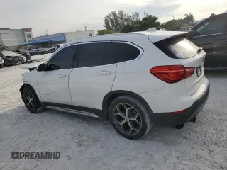 2016 BMW X1 xDrive28i z VIN WBXHT3C3XGP884843, wystawiony jako Copart lot #50605845 z przebiegiem 115 197 mil mil oraz Nie do naprawy • Non repairable. Historia ofert i sprzedaży dostępna na DreamBid. Obrazek 2.