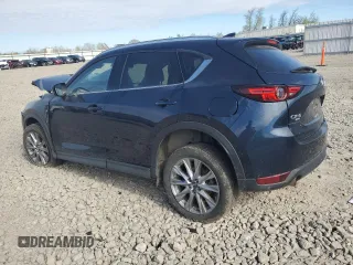 2020 Mazda CX-5 Grand Touring with VIN JM3KFBDM8L0763184, listed as a Copart auction lot 55575105 with 24,855 mi miles and Salvage Title. Bid and sale history available at DreamBid. Image 2.