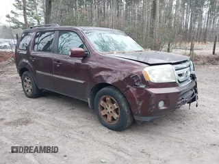 2010 Honda Pilot Touring with VIN 5FNYF4H9XAB040715, listed as a IAAI auction lot 41807334 with 262,786 mi miles and . Bid and sale history available at carsss.com. Image 1.