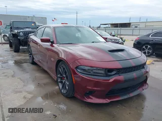 2020 Dodge Charger Scat Pack z VIN 2C3CDXGJ8LH132985, wystawiony jako IAAI lot #41316849 z przebiegiem 66 881 mil mil oraz . Historia ofert i sprzedaży dostępna na DreamBid. Obrazek 1.