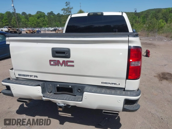 2015 GMC Sierra 1500 Denali with VIN 3GTU2WEJ7FG460695, listed as a IAAI auction lot 42023393 with 116,761 mi miles and . Bid and sale history available at DreamBid. Image 16.