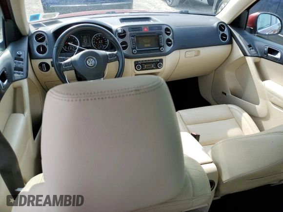 2011 Volkswagen Tiguan SE with VIN WVGBV7AX7BW001124, listed as a Copart auction lot 53044005 with 150,072 mi miles and Salvage Title. Bid and sale history available at DreamBid. Image 8.