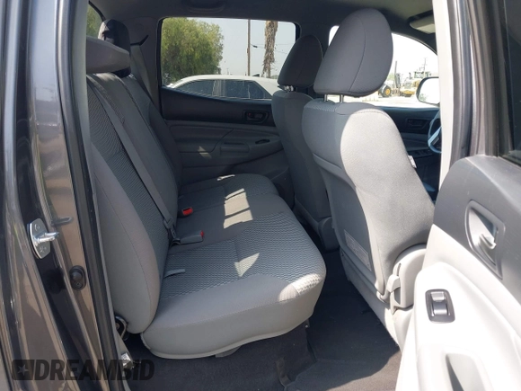2013 Toyota Tacoma PreRunner z VIN 5TFJX4GN2DX018800, wystawiony jako IAAI lot #42304447 z przebiegiem 188 409 mil mil oraz . Historia ofert i sprzedaży dostępna na DreamBid. Obrazek 8.
