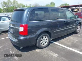 2013 Chrysler Town & Country Touring with VIN 2C4RC1BG8DR594671, listed as a IAAI auction lot 42039026 with 208,909 mi miles. Bid and sale history available at carsss.com. Image 4.