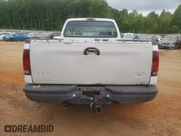 1999 Ford F-350 XL with VIN 1FTWW32FXXEB79284, listed as a Copart auction lot 53969905 with 241,082 mi miles and Salvage title. Bid and sale history available at DreamBid. Image 6.