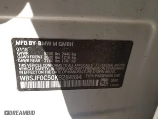 2019 BMW M5 with VIN WBSJF0C50KB284594, listed as a IAAI auction lot 41410008 with 1 mi miles. Bid and sale history available at carsss.com. Image 9.