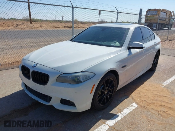 2013 BMW 5 Series 528i with VIN WBAXG5C56DD230121, listed as a IAAI auction lot 42019899 with 142,100 mi miles and . Bid and sale history available at carsss.com. Image 2.