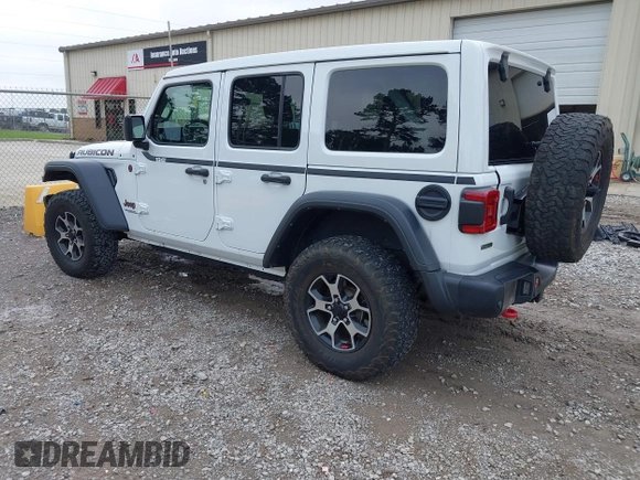 2021 Jeep Wrangler Unlimited Rubicon with VIN 1C4JJXFM9MW774142, listed as a IAAI auction lot 42625007 with 42,318 mi miles and . Bid and sale history available at DreamBid. Image 3.
