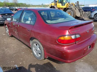 2002 Chevrolet Malibu LS with VIN 1G1NE52J12M577666, listed as a IAAI auction lot 41963454 with 195,399 mi miles. Bid and sale history available at carsss.com. Image 3.