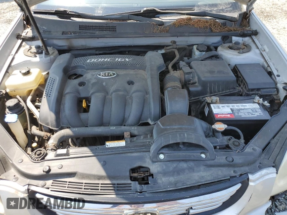 2008 Kia Optima LX z VIN KNAGE123185190108, wystawiony jako Copart lot #59364195 z przebiegiem 131 344 mil mil oraz Szkoda całkowita • Salvage title. Historia ofert i sprzedaży dostępna na DreamBid. Obrazek 11.