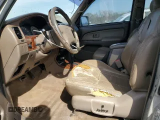 1999 Toyota 4Runner Limited with VIN JT3GN87R5X0115971, listed as a Copart auction lot 50742105 with 323,635 mi miles and Salvage Title. Bid and sale history available at DreamBid. Image 7.