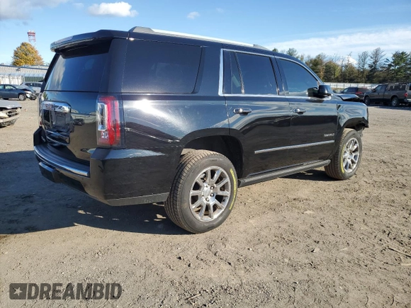 2016 GMC Yukon Denali with VIN 1GKS1CKJXGR329103, listed as a Copart auction lot 75492494 with 124,374 mi miles and Salvage Title. Bid and sale history available at carsss.com. Image 3.