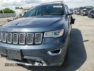 2020 Jeep Grand Cherokee High Altitude with VIN 1C4RJFCT0LC225003, listed as a Copart auction lot 56687565 with 125,090 mi miles and Salvage title. Bid and sale history available at DreamBid. Image 14.