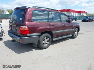2002 Toyota Land Cruiser with VIN JTEHT05J422022565, listed as a IAAI auction lot 42042565 with 550,000 mi miles. Bid and sale history available at carsss.com. Image 4.