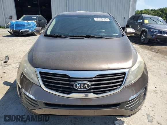 2012 Kia Sportage LX with VIN KNDPBCA20C7214959, listed as a Copart auction lot 62730645 with 194,768 mi miles and Clean title. Bid and sale history available at DreamBid. Image 5.