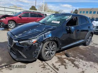 2016 Mazda CX-3 Grand Touring z VIN JM1DKBD75G0105254, wystawiony jako Copart lot #53519525 z przebiegiem 76 962 mil mil oraz Szkody całkowita. Historia ofert i sprzedaży dostępna na DreamBid. Obrazek 1.
