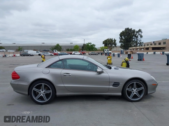 2005 Mercedes-Benz SL 500 z VIN WDBSK75F75F102486, wystawiony jako IAAI lot #42129769 z przebiegiem 61 246 mil mil oraz . Historia ofert i sprzedaży dostępna na DreamBid. Obrazek 13.