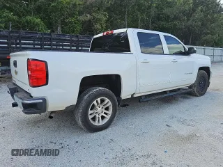 2018 Chevrolet Silverado 1500 LT with VIN 3GCPCREC3JG620531, listed as a Copart auction lot 54795545 with 130,608 mi miles and Clean Title. Bid and sale history available at DreamBid. Image 3.
