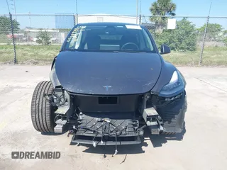2021 Tesla Model Y Long Range with VIN 5YJYGDEE4MF076791, listed as a IAAI auction lot 41945750 with Not Provided miles and . Bid and sale history available at DreamBid. Image 6.