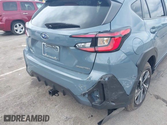 2024 Subaru Crosstrek Premium z VIN JF2GUADC7R8299418, wystawiony jako IAAI lot #42358005 z przebiegiem 21 690 mil mil oraz . Historia ofert i sprzedaży dostępna na DreamBid. Obrazek 18.