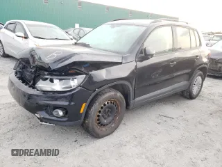 2017 Volkswagen Tiguan with VIN WVGHV7AX0HK039238, listed as a Copart auction lot 70414904 with 115,371 mi miles and Salvage title. Bid and sale history available at DreamBid. Image 1.