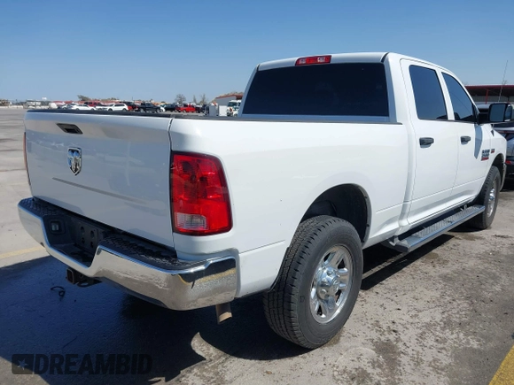 2014 Ram 2500 Tradesman with VIN 3C6TR4CT6EG243306, listed as a IAAI auction lot 41860120 with 101,110 mi miles and . Bid and sale history available at DreamBid. Image 4.