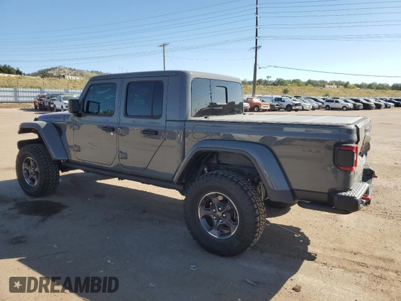 2022 Jeep Gladiator Rubicon z VIN 1C6JJTBG9NL101774, wystawiony jako Copart lot #74597074 z przebiegiem 11 903 mil mil oraz Szkoda całkowita • Salvage title. Historia ofert i sprzedaży dostępna na DreamBid. Obrazek 2.