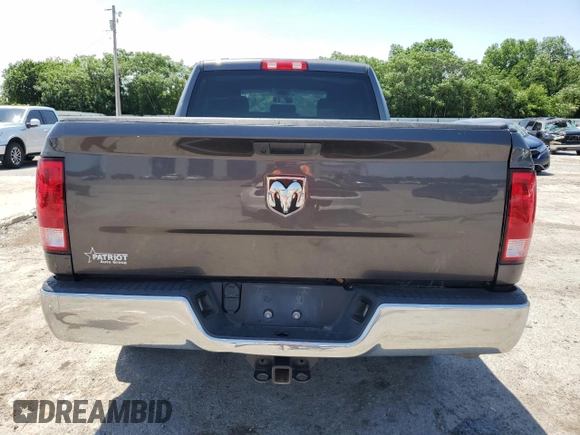2021 Ram 1500 Tradesman with VIN 1C6RR6FG4MS524919, listed as a Copart auction lot 61338335 with 126,486 mi miles and Salvage title. Bid and sale history available at DreamBid. Image 6.