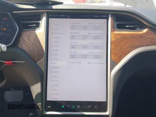 2020 Tesla Model S Long Range with VIN 5YJSA1E27LF397346, listed as a IAAI auction lot 40579015 with 43,779 mi miles and . Bid and sale history available at DreamBid. Image 18.