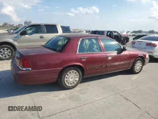 2004 Ford Crown Victoria Standard с VIN 2FAFP73W54X135518, выставлен на аукционе Copart как лот 72084114 с пробегом 145 716 миль миль и Списание • Salvage title. История ставок и продаж доступна на DreamBid. Изображение 3.