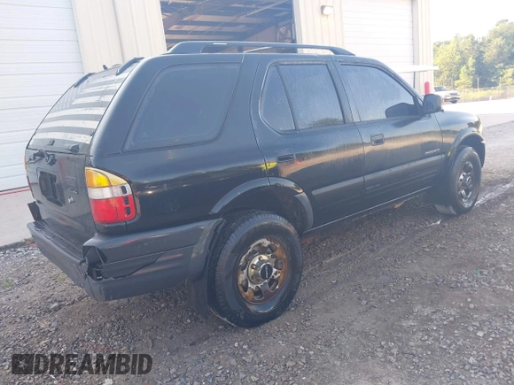 1998 Isuzu Rodeo with VIN 4S2CK58DXW4316412, listed as a IAAI auction lot 42785298 with 262,478 mi miles and . Bid and sale history available at DreamBid. Image 4.