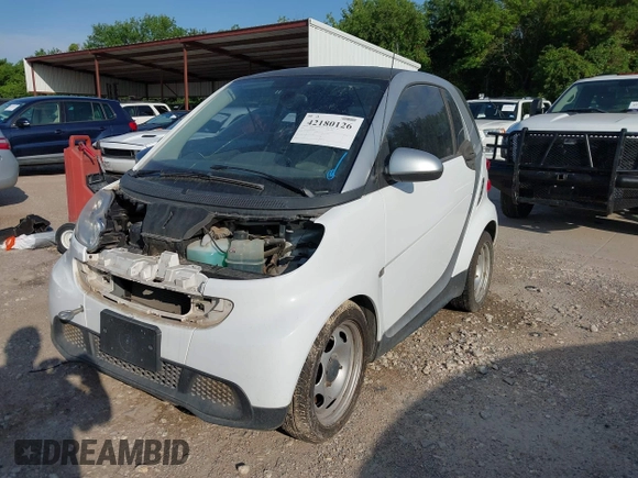 2015 Smart fortwo Passion with VIN WMEEJ3BA4FK800163, listed as a IAAI auction lot 42180126 with 53,138 mi miles. Bid and sale history available at carsss.com. Image 2.