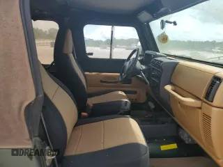 1998 Jeep Wrangler SE with VIN 1J4FY29P8WP784825, listed as a Copart auction lot 61581205 with 148,152 mi miles and Clean title. Bid and sale history available at DreamBid. Image 10.