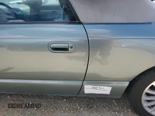 2004 Ford Thunderbird Pacific Coast Roadster with VIN 1FAHP63A04Y108766, listed as a Copart auction lot 74766964 with 30,107 mi miles and Salvage Title. Bid and sale history available at DreamBid. Image 12.