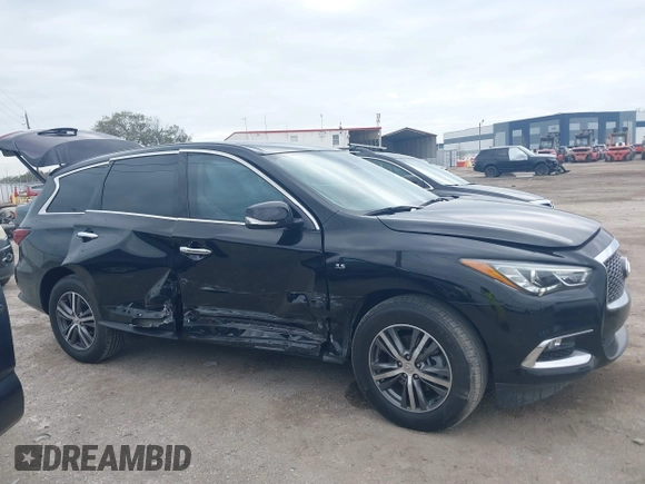 2020 Infiniti QX60 Pure with VIN 5N1DL0MN0LC527050, listed as a IAAI auction lot 41734032 with 71,204 mi miles and . Bid and sale history available at DreamBid. Image 13.