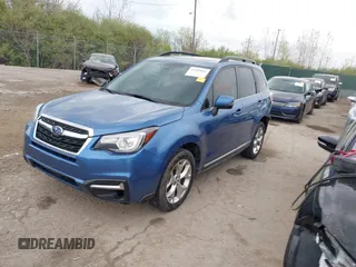 2017 Subaru Forester Touring with VIN JF2SJAWC4HH803275, listed as a IAAI auction lot 42109087 with 114,532 mi miles and . Bid and sale history available at DreamBid. Image 2.