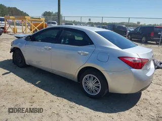 2019 Toyota Corolla L with VIN 2T1BURHEXKC163703, listed as a IAAI auction lot 41870512 with 131,153 mi miles. Bid and sale history available at carsss.com. Image 3.