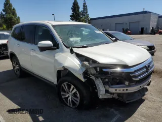 2018 Honda Pilot EX-L with VIN 5FNYF5H5XJB031533, listed as a Copart auction lot 64419275 with 38,373 mi miles and Salvage title. Bid and sale history available at DreamBid. Image 4.