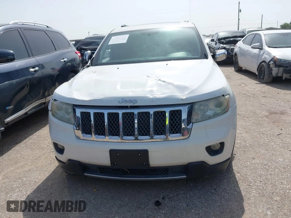 2011 Jeep Grand Cherokee Overland Summit with VIN 1J4RR6GTXBC683854, listed as a IAAI auction lot 42626452 with Not provided miles and . Bid and sale history available at DreamBid. Image 12.