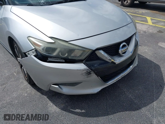 2016 Nissan Maxima SL with VIN 1N4AA6AP0GC433932, listed as a IAAI auction lot 41897180 with 91,871 mi miles and . Bid and sale history available at DreamBid. Image 20.