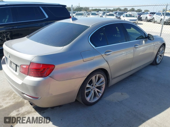 2015 BMW 5 Series 535i with VIN WBA5B1C56FG125286, listed as a IAAI auction lot 41747088 with 136,970 mi miles and . Bid and sale history available at carsss.com. Image 4.