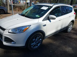 2016 Ford Escape SE with VIN 1FMCU0G9XGUB90670, listed as a IAAI auction lot 41694382 with 167,631 mi miles. Bid and sale history available at carsss.com. Image 17.