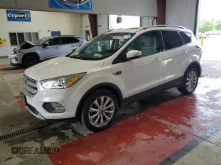 2018 Ford Escape Titanium with VIN 1FMCU9J90JUB30658, listed as a Copart auction lot 64001665 with 61,970 mi miles and Salvage title. Bid and sale history available at DreamBid. Image 1.