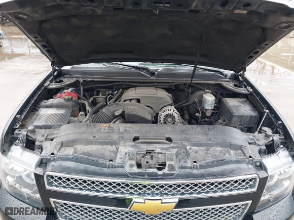 2013 Chevrolet Suburban LT with VIN 1GNSKJE71DR308480, listed as a IAAI auction lot 41695090 with 129,000 mi miles. Bid and sale history available at carsss.com. Image 10.